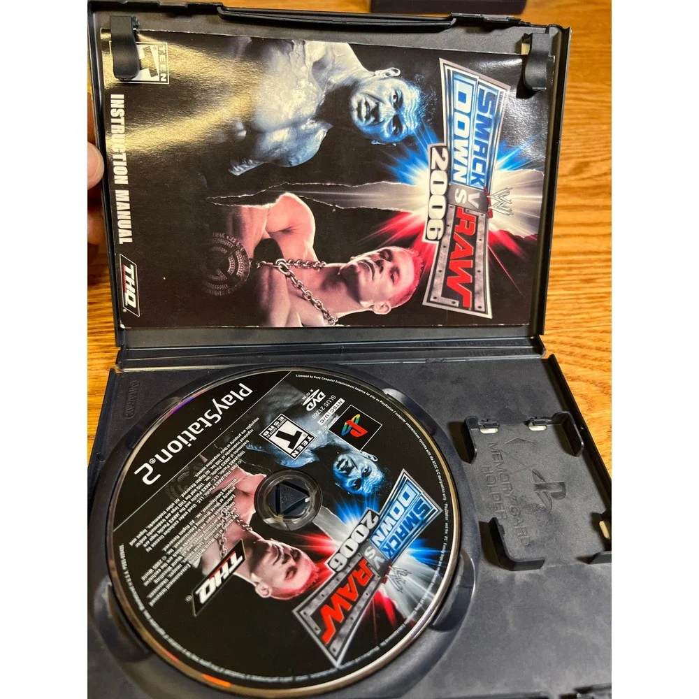WWE SmackDown vs Raw 2006 Sony PlayStation 2 PS2 CIB Complete with Manual